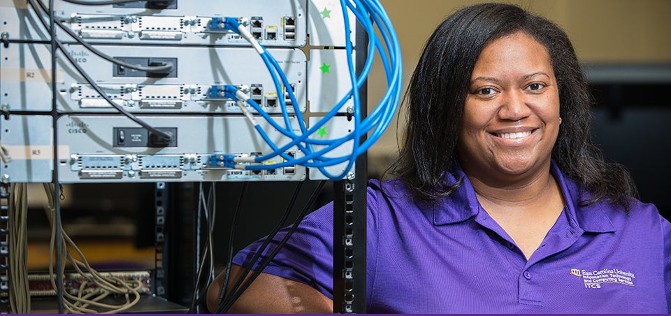 ECU information and computer technology student Shauna Holley was selected to be a member of Cisco's Dream Team, which supports the network operations center during an international conference in San Diego. (Photo by Cliff Hollis)