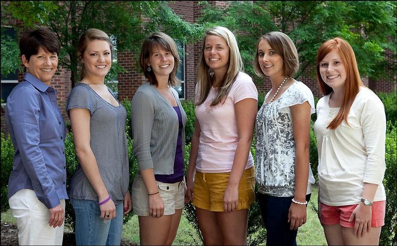 From left to right, senior class officers who led fundraising efforts are pictured with Dr. Kim Larson, assistant professor of nursing, at left, class vice president Rachel Steeb, historian Logan Monroe, secretary Paige Ray, treasurer Natalie Tyson, and president Kaitlyn Whitlock. Photo by Cliff Hollis, ECU News Services.