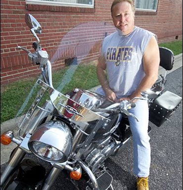 Jeff Charles hosts an annual motorcycle ride to benefit a scholarship fund in memory of his daughter. (Photos by Cliff Hollis)