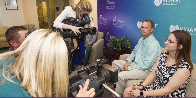 Kidney recipient Roger Woolard, second from right, and donor Robin Melendez, right, speak to the press during a press conference announcing a successful kidney swap and transplant performed by physicians from the Brody School of Medicine at East Carolina University and Eastern Urological Associates. (Photos by Jay Clark)