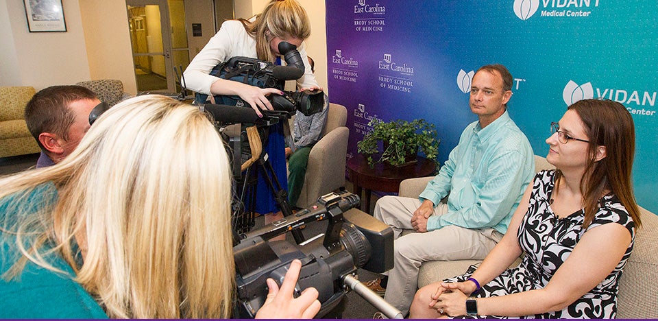 Kidney recipient Roger Woolard, second from right, and donor Robin Melendez, right, speak to the press during a press conference announcing a successful kidney swap and transplant performed by physicians from the Brody School of Medicine at East Carolina University and Eastern Urological Associates. (Photos by Jay Clark)