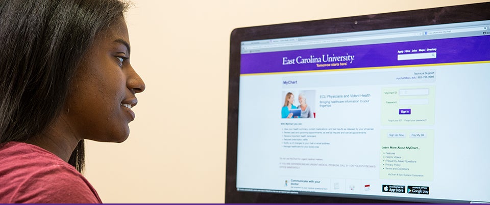 ECU Physicians’ online patient portal, MyChart, allows individuals like ECU student Summer Tillman, pictured above using the MyChart web site, to access their health care team electronically. (Photo by Cliff Hollis)