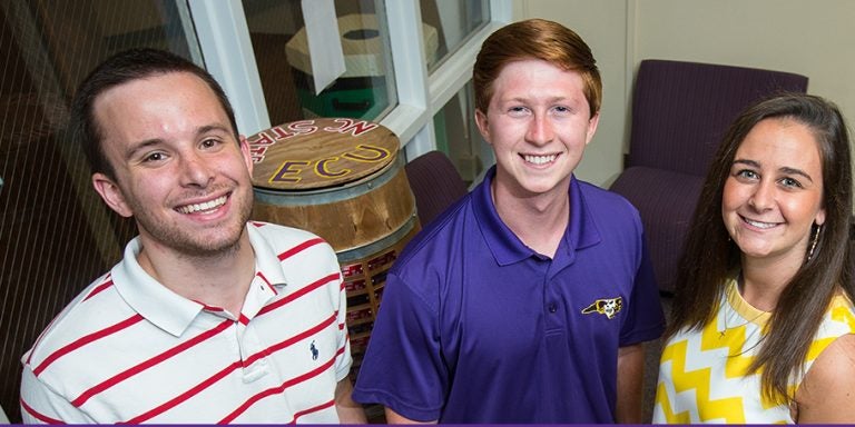 New SGA officers sworn in this April include, left to right, treasurer Carson Pierce, president Mark Matulewicz and vice president Jenny Betz. Chelsea Scott of Charlotte joined the slate of officers as secretary this summer. (Photo by Cliff Hollis)