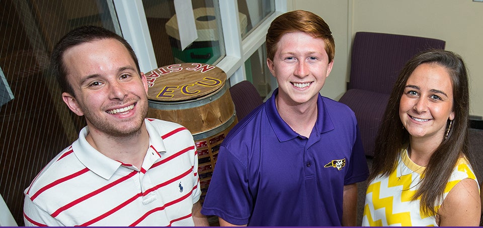 New SGA officers sworn in this April include, left to right, treasurer Carson Pierce, president Mark Matulewicz and vice president Jenny Betz. Chelsea Scott of Charlotte joined the slate of officers as secretary this summer. (Photo by Cliff Hollis)