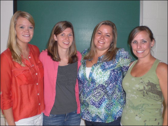 ECU elementary education graduate students who initiated the flat mascot exchange with Rollins College are, left to right, Beth Laughridge, Laura Wetherington, Sylvia Dieu and Stephanie Burress. (Photo by Kendra Alexander)