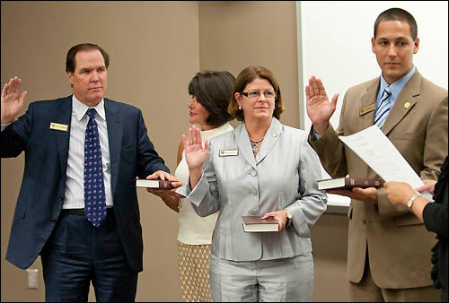 Three new members were installed at the July 21 meeting of the East Carolina University Board of Trustees. Pictured above, left to right, they are Kieran Shanahan of Raleigh, Deborah Davis of Richmond, Va., and SGA president Josh Martinkovic of Charlotte. (Photos by Jay Clark, University Publications)