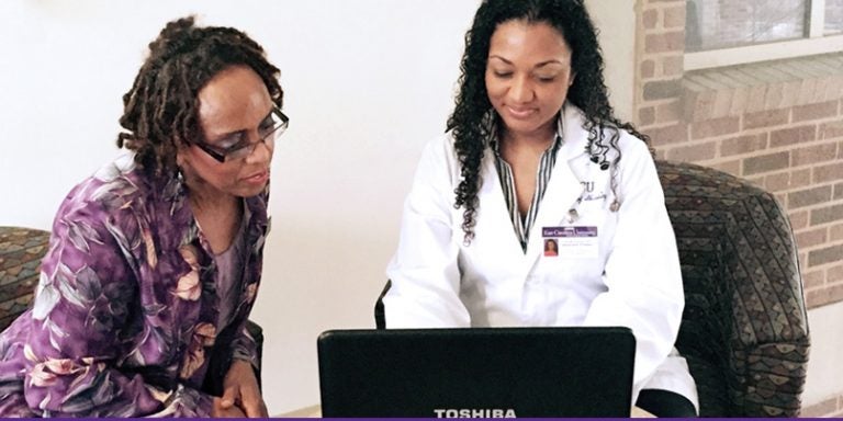 Nursing professor Dr. Pamela Reis, left, and nurse-midwifery student Farrah Forney review information about a virtual patient online. The virtual patient is being used in a plan of treatment that includes faculty and students from multiple disciplines at ECU. (Photos courtesy of Pamela Reis)