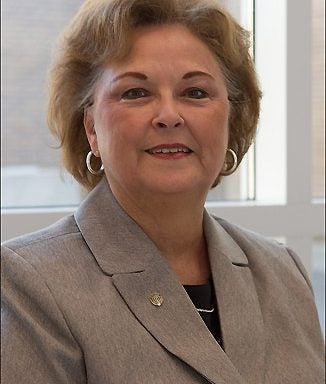 Lou Anna Hardee in ECU's College of Education has held numerous leadership positions in the Optimist Club of Greenville.(Photo by Cliff Hollis)