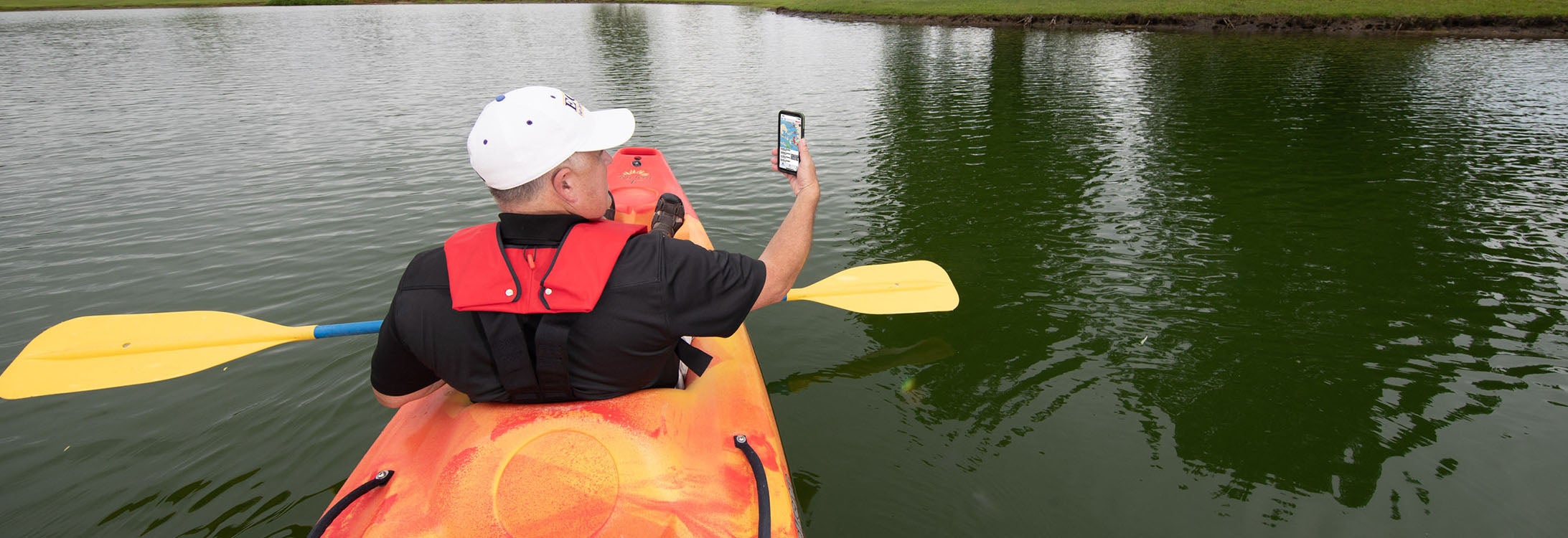 ECU professor Ernie Marshburn has developed a new approach to boating safety using an app on boaters’ phones. (Photos by Cliff Hollis)