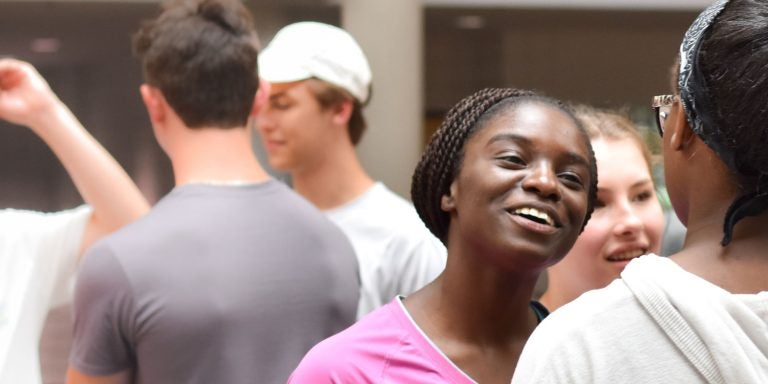 Group of teens talking and laughing