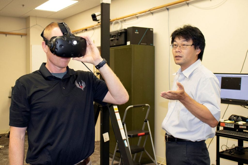 Air Force member tries out virtual reality equipment