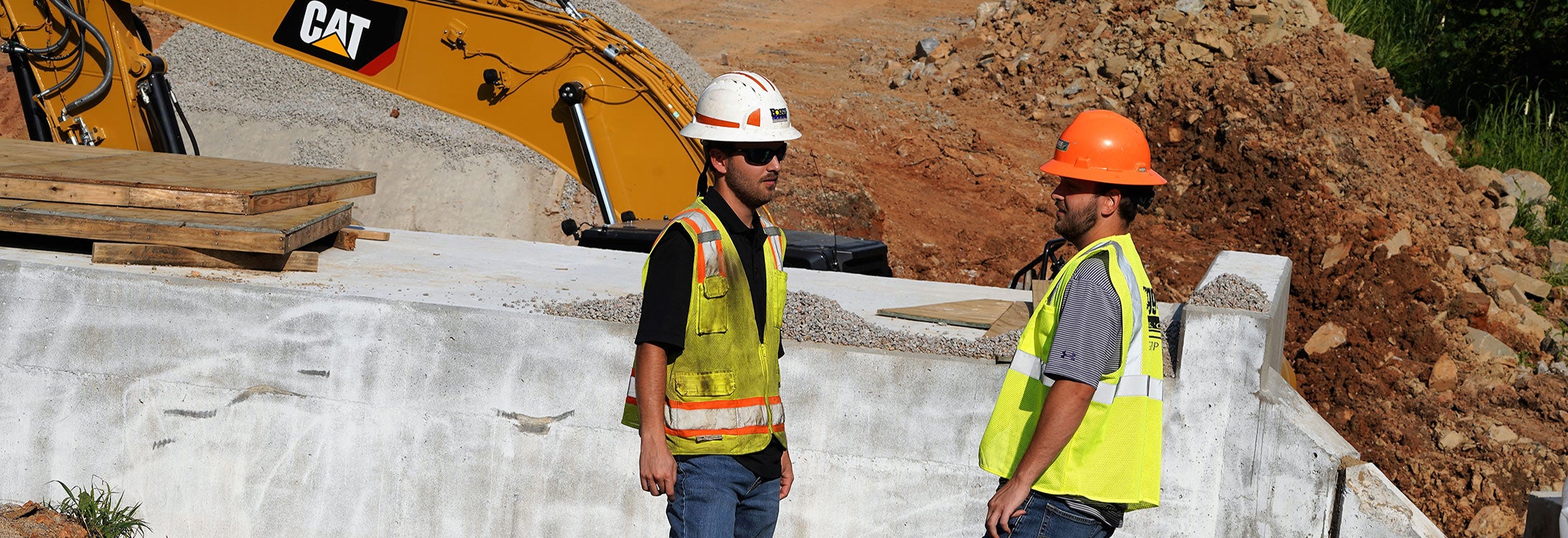 Twins Matthew, left, and Andrew Guillot, seniors in ECU’s construction management program, interned this summer.