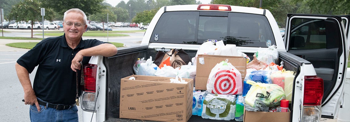 College of Nursing staff member Tom Andresky transported a pickup truck full of water, food, cleaning supplies and other crucial items collected by the college to the St. Pauls community. (Contributed photo)