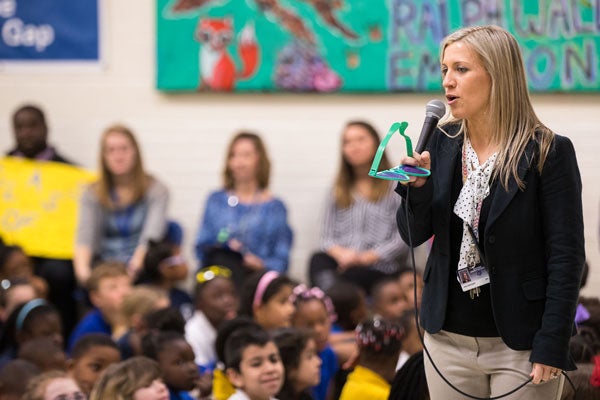 Elmhurst Elementary School Principal Colleen Burt talks with students during career week in 2017. A goal of the ECU project will be to improve student achievement by supporting principals in their work. (Photo by Cliff Hollis)