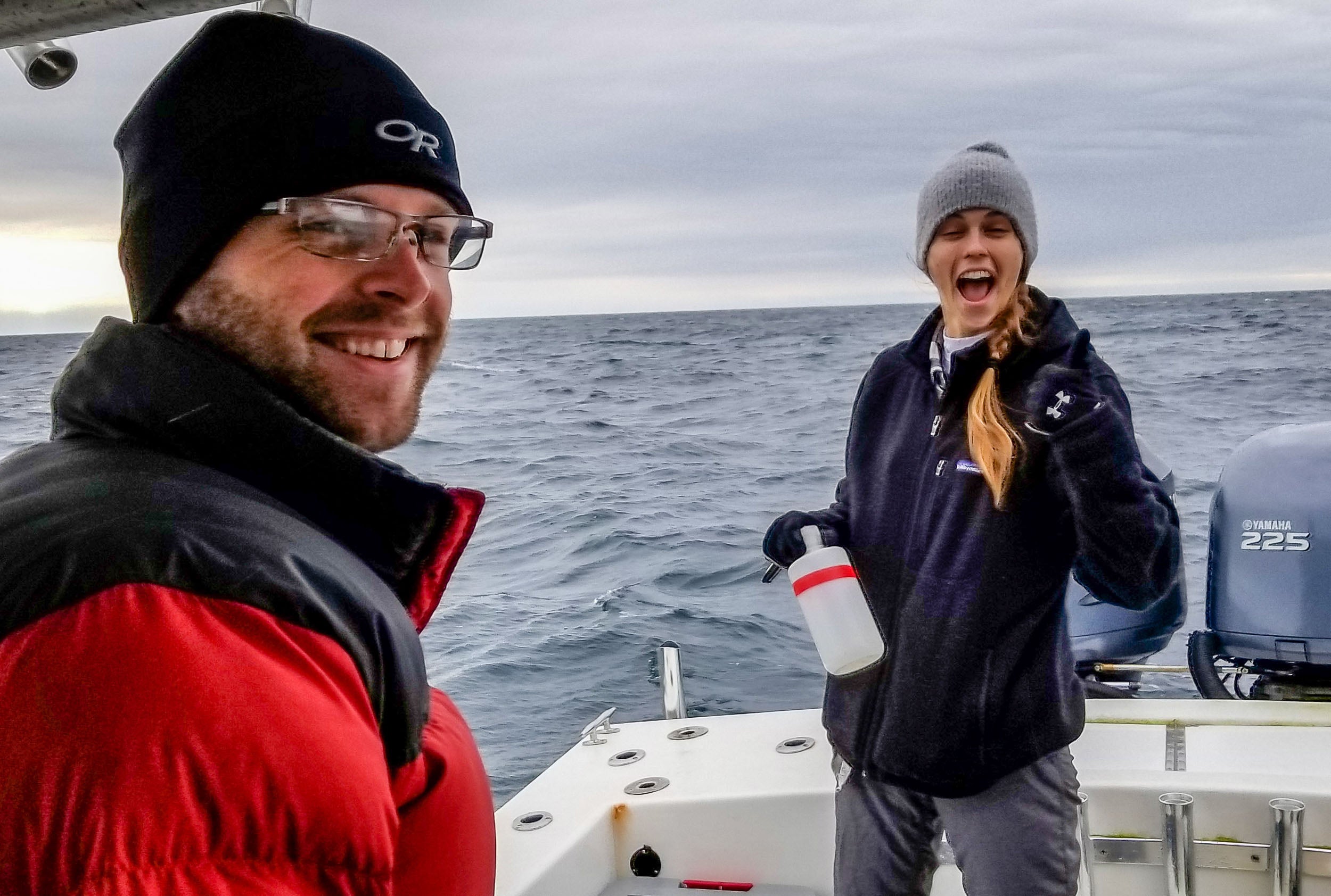 Graduate student Taylor Miller (left), Mitra’s student researcher, and Liz Mason (right), Corbett’s technician, give a thumbs up as they assist Mitra’s team in examining the sediment entering the Pamlico Sound after Hurricane Florence.