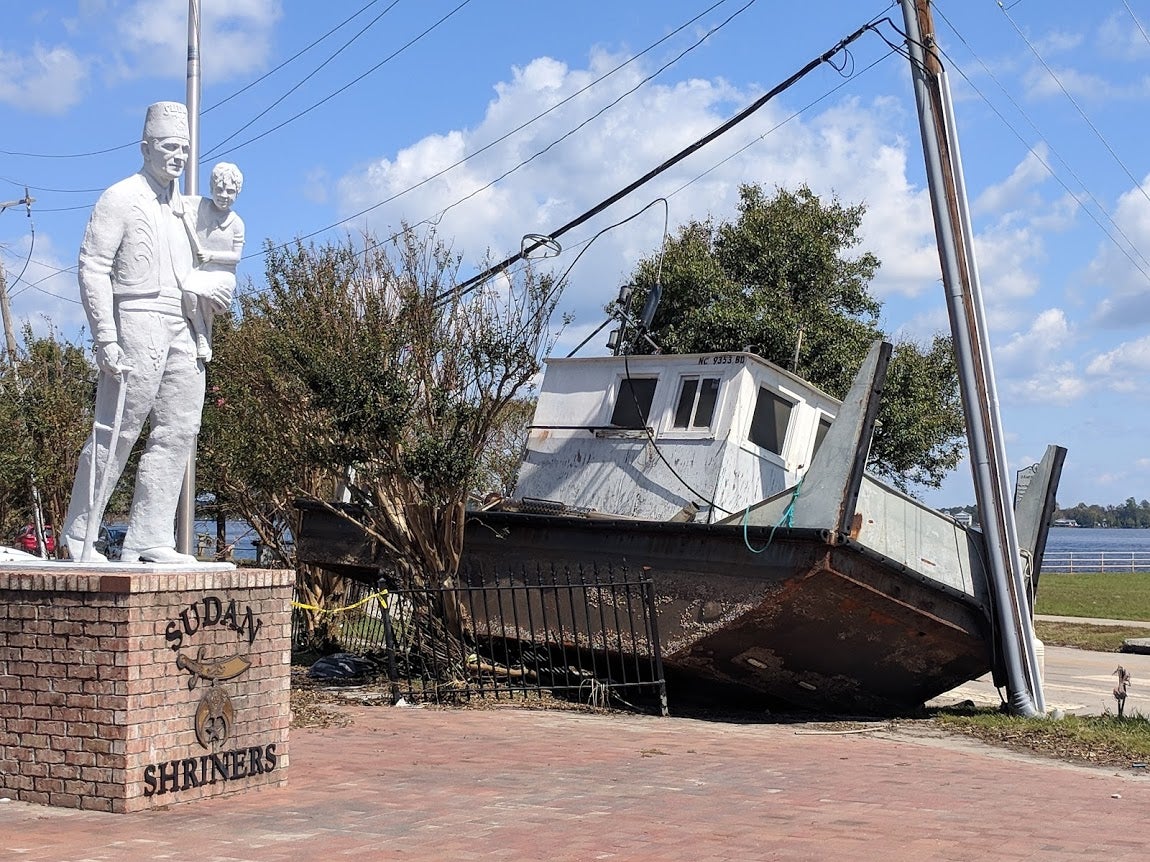 While examining the flooding impacts of Hurricane Florence, Dr. Stephen Moysey found this boat had been pushed ashore in New Bern.