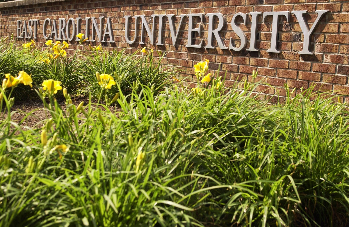 East Carolina University sign in front of Jenkins Fine Arts building. 