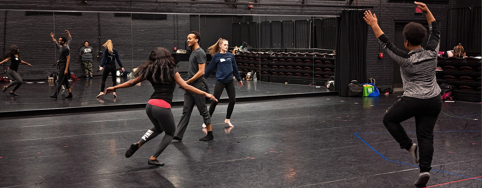 High school students dance under the direction of ECU senior Donterreo Culp on March 8. 