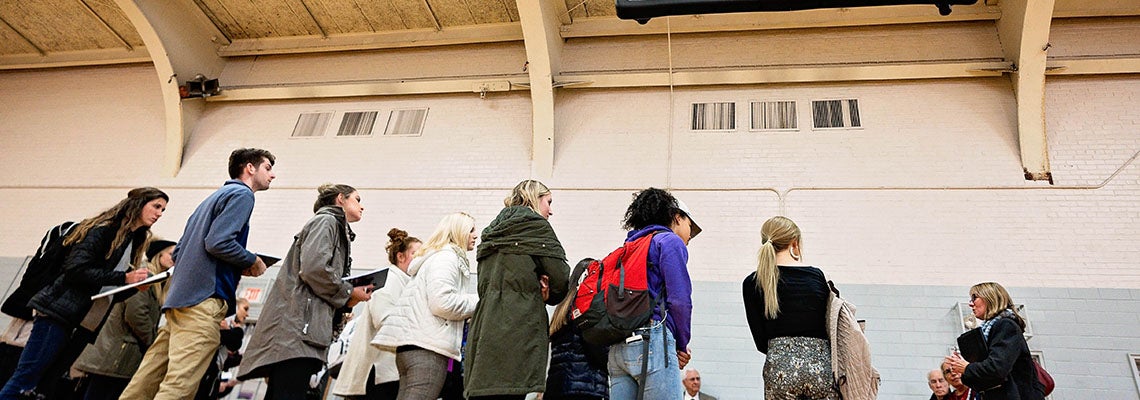 Students and College of Health and Human Performance Advancement Council members tour Christenbury Gym.