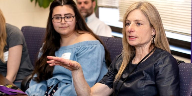 Voyages of Discovery presenter Dr. Lisa Randall meets with students prior to her evening presentation on Thursday.