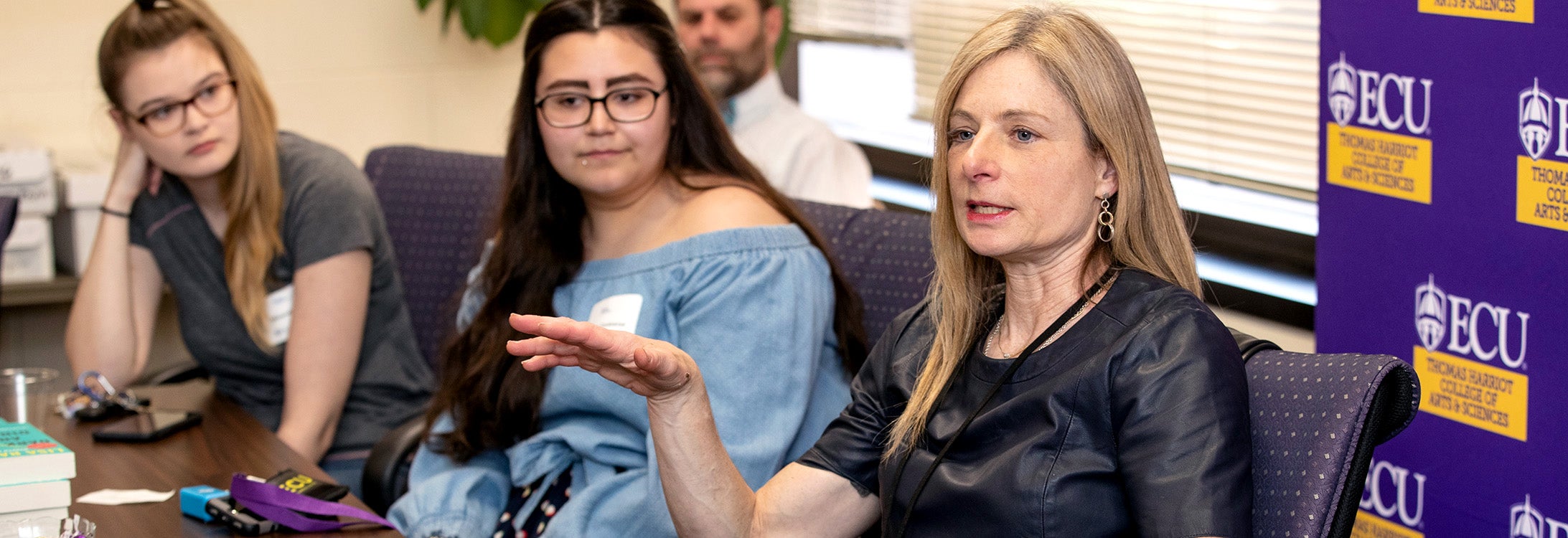 Voyages of Discovery presenter Dr. Lisa Randall meets with students prior to her evening presentation on Thursday.