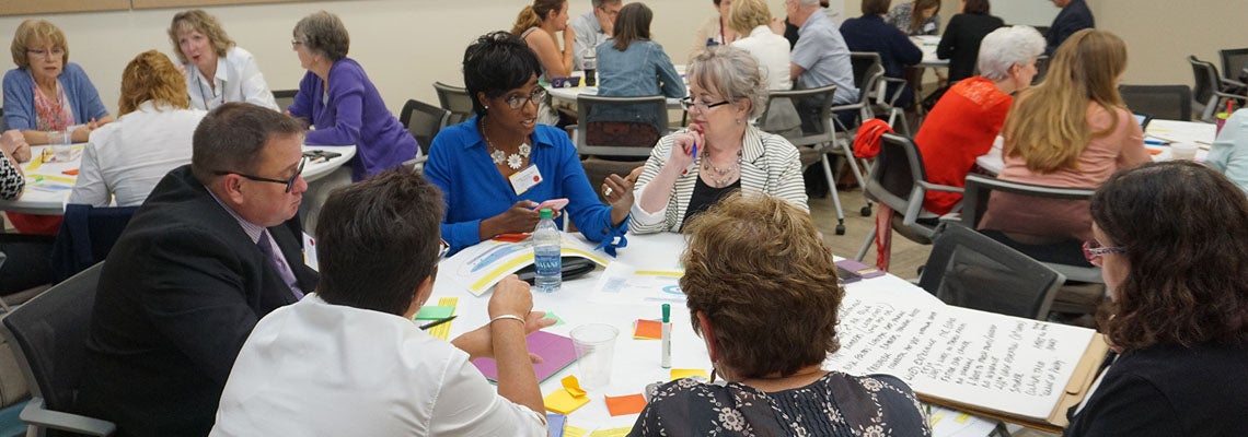 Conference participants broke into small groups to share their experiences and ideas for the future of health care. (Photo by Jackie Drake)