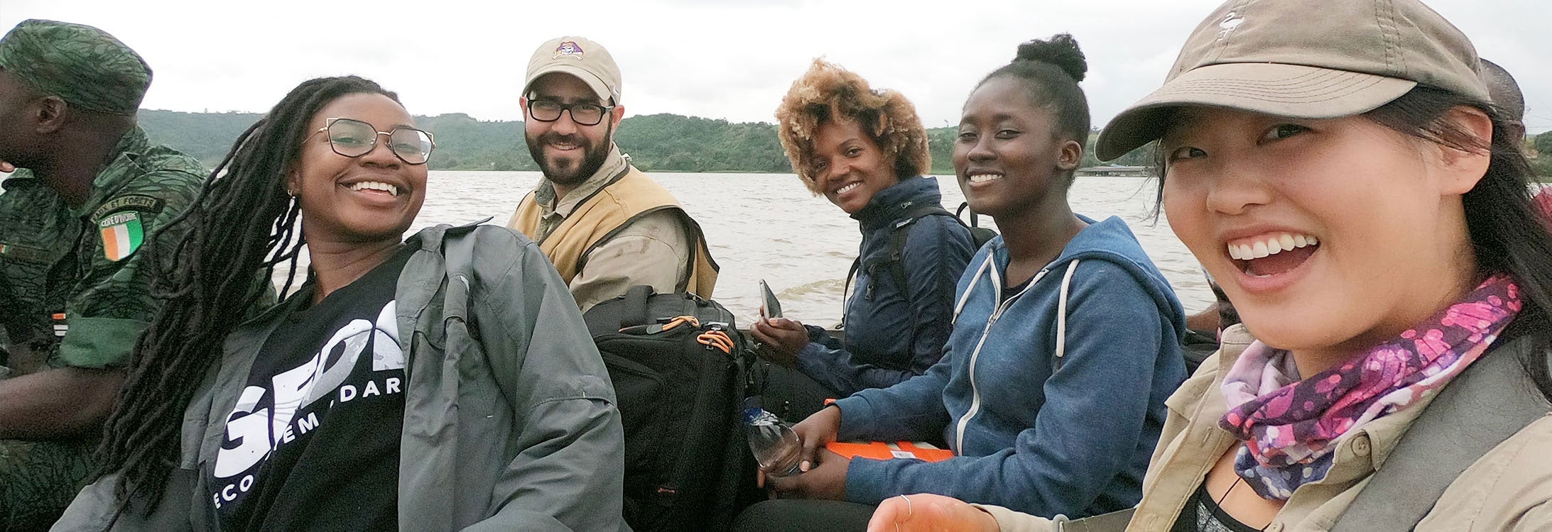 ECU Assistant Professor David Lagomasino, center, travels on a boat with students and research colleagues in West Africa. Lagomasino visited the region in August to study the coastal ecosystem which resembles North Carolina’s coast.