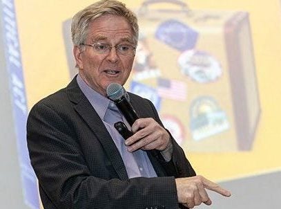 Rick Steves speaks to hundreds of people at the Voyages of Discovery Series lecture. Contributed photo by Rob Taylor.