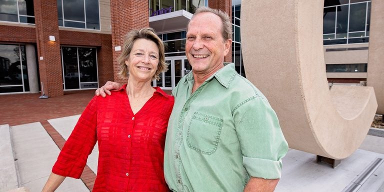 The Harrises’ love story started before they arrived at ECU as graduate students, but it brought them back to campus as professors 20 years after they graduated.<br>(Photo by Cliff Hollis)