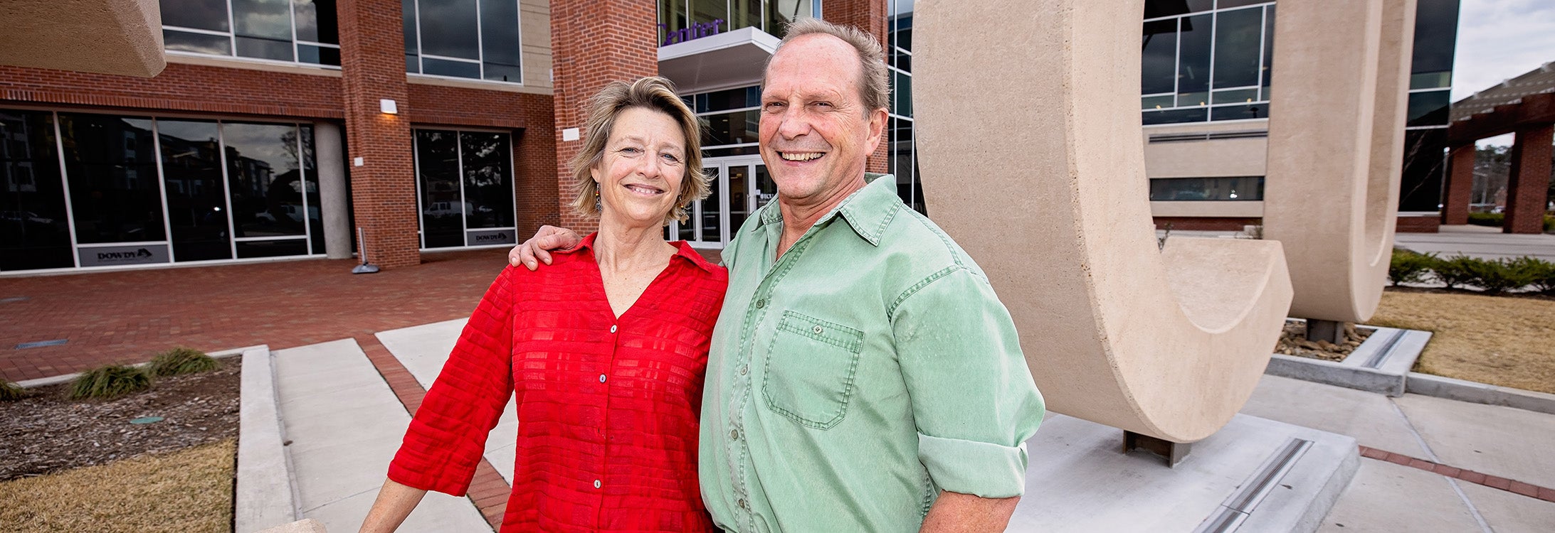 The Harrises’ love story started before they arrived at ECU as graduate students, but it brought them back to campus as professors 20 years after they graduated.<br>(Photo by Cliff Hollis)