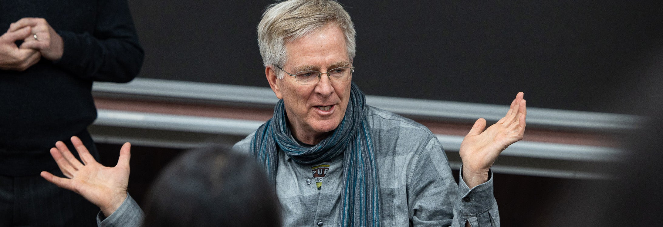 Rick Steves talks with students in the Bate Building. (Photos by Cliff Hollis)