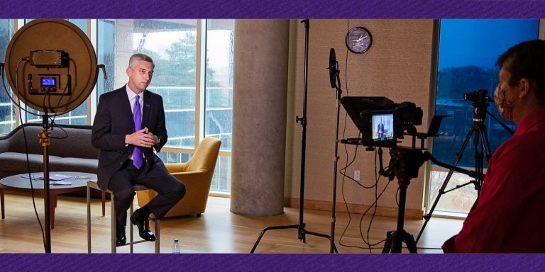 East Carolina University Chancellor-Elect Dr. Philip Rogers films his introductory video to Pirate Nation in the Trustees Suite at the Main Campus Student Center on campus. (Photo by Cliff Hollis | Video by ECU Creative Services and Reed Wolfley)