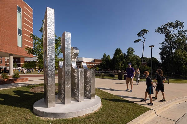 A memorial sculpture for 9/11 victims was unveiled during a ceremony on Saturday. (Photo by Cliff Hollis)