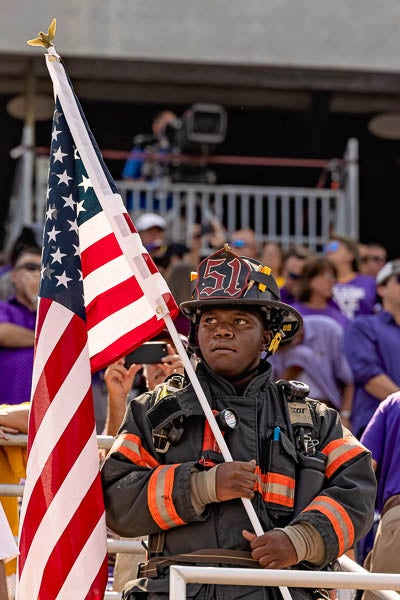 Greenville and Red Oak firefighters symbolically climbed the stairs at Dowdy-Ficklen Stadium Saturday in honor of first responders killed during the 9/11 attacks. (Photo by Cliff Hollis)