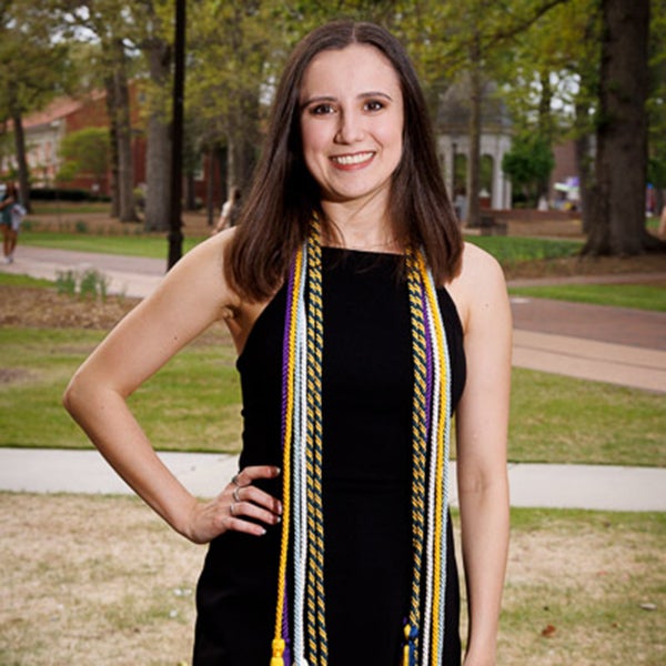 ECU grad profile Madeline Douglas poses on campus.