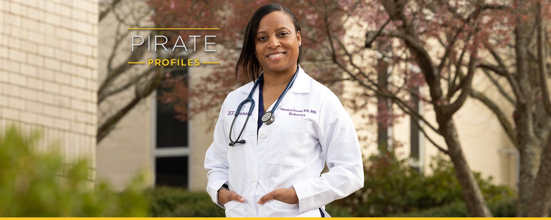 Dr. Shaundreal Jamison posts for a portrait photo