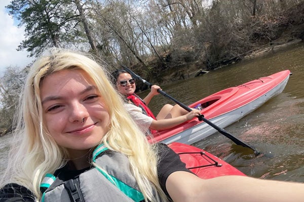 As part of their research, Anjalee Hou and Taylor Cash take trips with Dr. Emily Yeager to experience some of the assets they are mapping in the BEC.