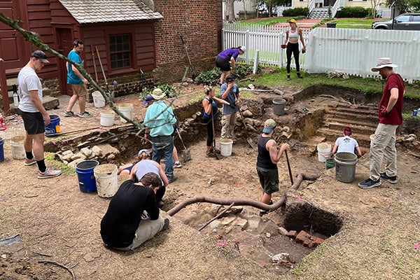 ECU students and faculty work at a dig site at the Palmer-Marsh house in Bath.