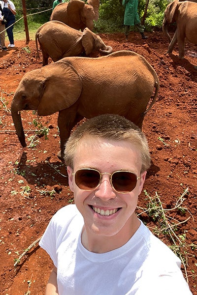 ECU student Adrian Jones meets his adopted elephant, Kindani. 