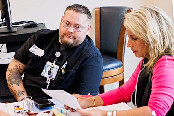 A nurse interviews a role-playing "patient" during a sexual assault evidence gathering session on as part of a joint North Carolina Department of Justice and the North Carolina Area Health Education Center (AHEC) program to train Sexual Assault Nurse Examiners.