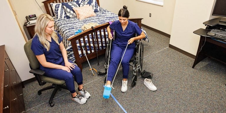 ECU occupational therapy students practice guiding patients through life tasks in the College of Allied Health’s simulated apartment, where students use hands-on approaches to learn occupational therapy skills.