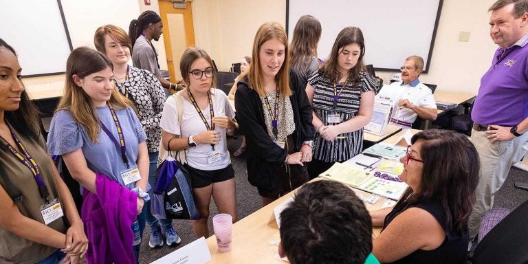 High school students participating in the PIRATE Institute interact with ECU College of Education faculty to learn more about pursuing an education degree.