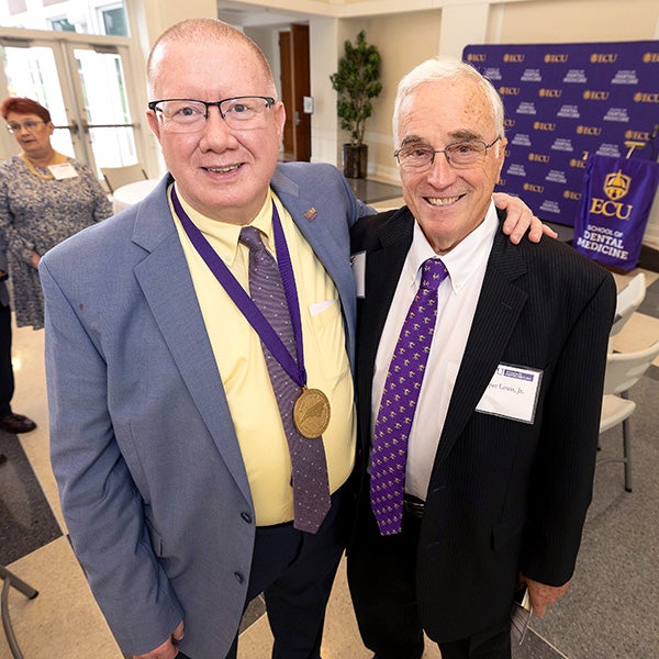 Dr. Michael Webb, left, who was named the inaugural Jasper L. Lewis, Jr. Distinguished Scholar, stands with Dr. Jasper Lewis, a longtime Greenville pediatric dentist for which the Distinguished Professorship in Pediatric Dentistry was named.