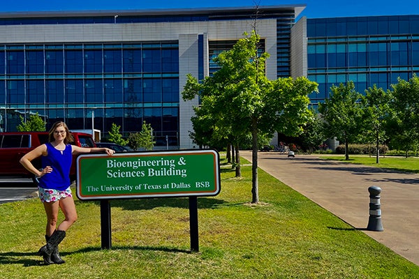 Mandee Schaub stands in front of the Bioengineering and Sciences Building at the University of Texas-Dallas, where the East Carolina University grad is pursuing a doctorate in neuroscience. (Contributed photos)