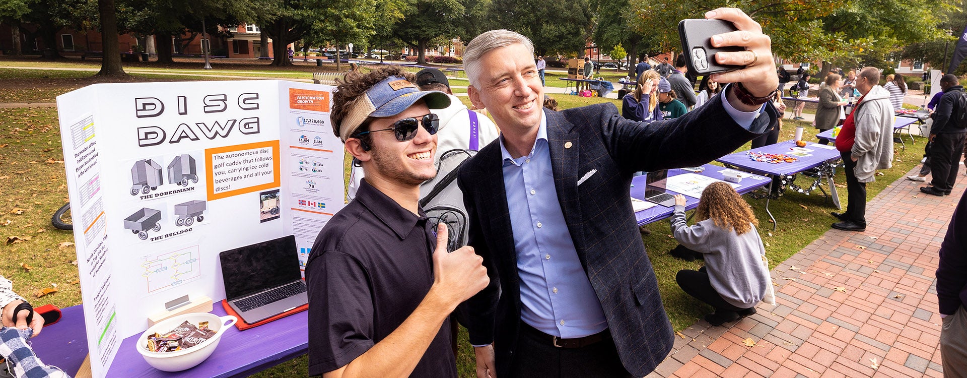 Chancellor Philip Rogers takes a selfie with Mason Carron during the Pirate Entrepreneurship Challenge. (Photo by Rhett Butler)