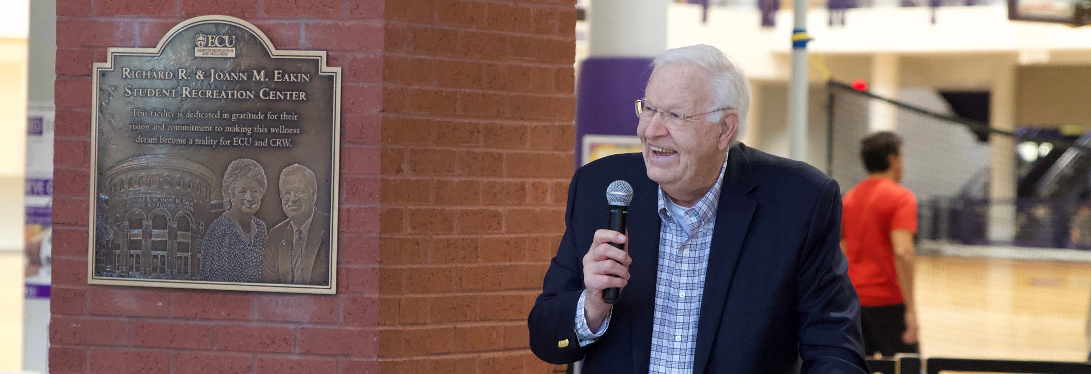 Former Chancellor Dr. Dick Eakin speaks during the dedication where a plaque was unveiled at the Richard R. and JoAnn M. Eakin Student Recreation Center at East Carolina University.