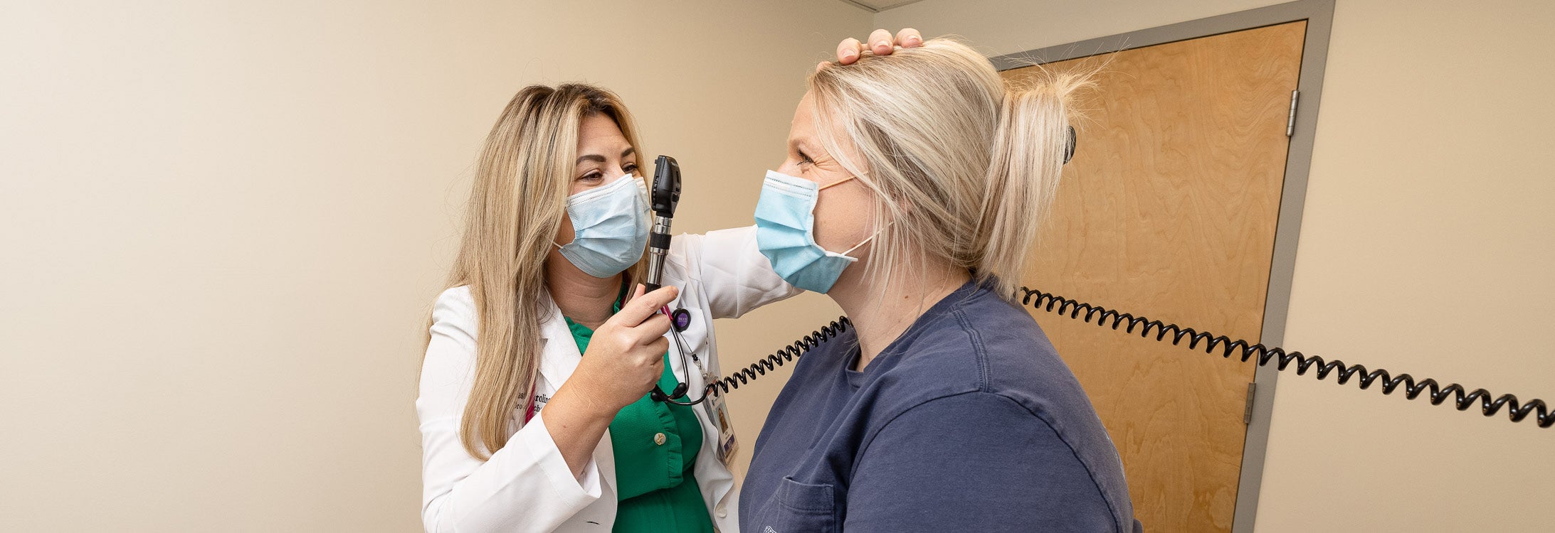 Dr. Amy White-Jones, one of the first residents in Brody and ECU Health’s Rural Family Medicine Residency program, examines a patient at Goshen Medical Center in Beulaville.