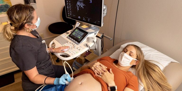 Stephanie Fiust, who has a high-risk pregnancy, receives an ultrasound at Carteret Ob-Gyn as part of East Carolina University's MOTHeRS Project.