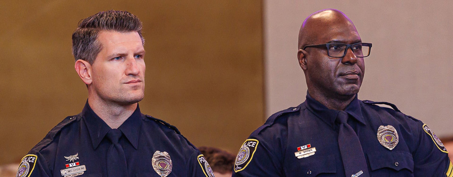 East Carolina University police officers Michael Fecteau, left, and William Brown were honored by the Board of Governors on Thursday with the University of North Carolina System's Valor Award.