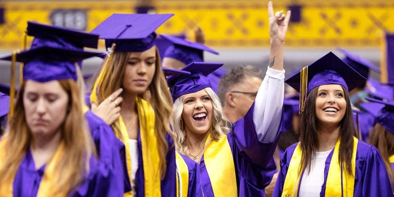 Almost 2,000 graduates were recognized at East Carolina University’s fall 2022 commencement ceremony in Minges Coliseum.